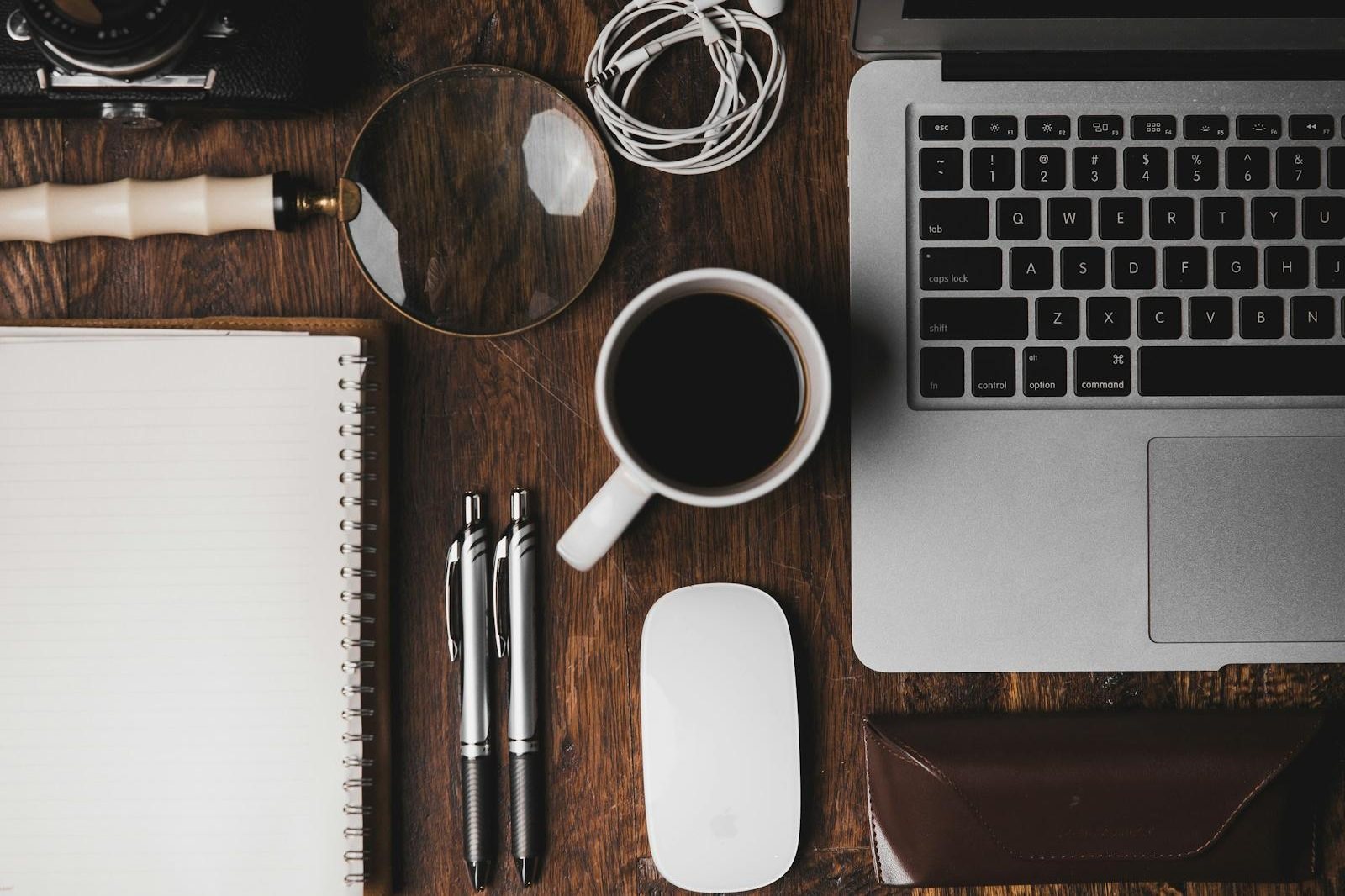 Overhead view of a busy work desk